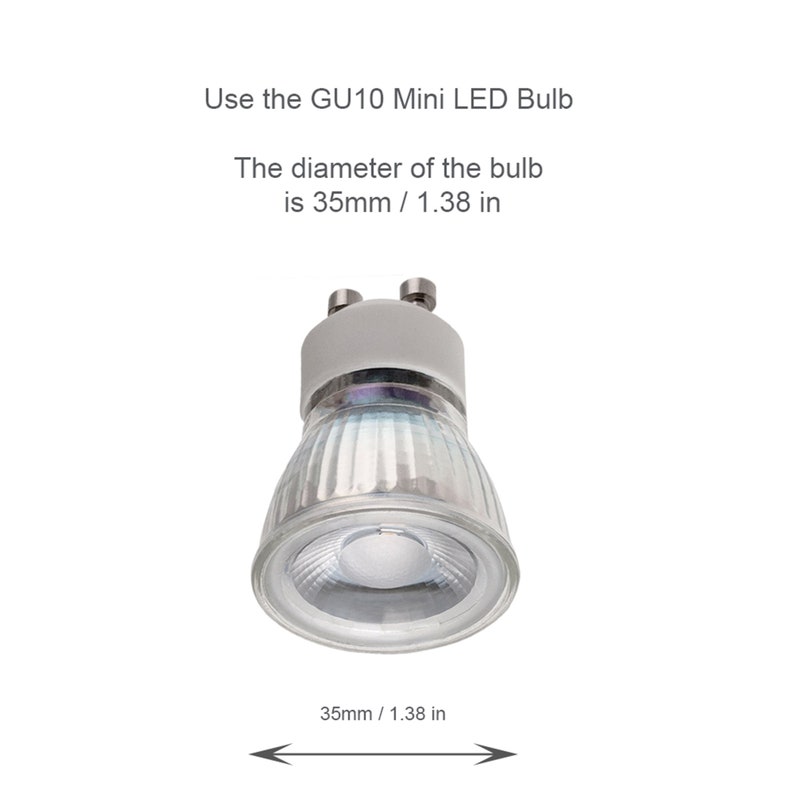 May include: A clear glass GU10 Mini LED bulb with a silver metal base. The bulb is 1.38 inches in diameter.