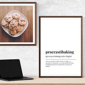 May include: A framed print with the definition of the word "procrastibaking" which is defined as "when you decide to bake bread, or cookies, or cupcakes, or macarons, or a cake instead of doing something much more boring like your taxes or laundry."