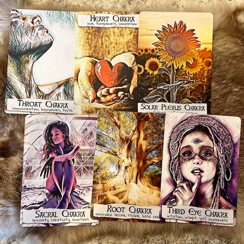 May include: A set of seven chakra cards with colorful illustrations and text describing each chakra. The cards feature images of a sunflower, a heart, a tree, a woman with her head tilted back, a woman sitting with her legs crossed, a woman with her hand on her chin, and a pair of hands holding a heart.
