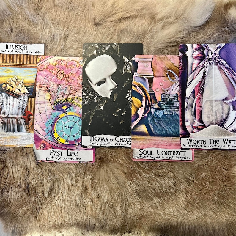 May include: Five tarot cards with colorful illustrations and text. The cards are laid out in a row from left to right. The card titles are: Illusion, Past Life, Drama & Chaos, Soul Contract, and Worth the Wait.