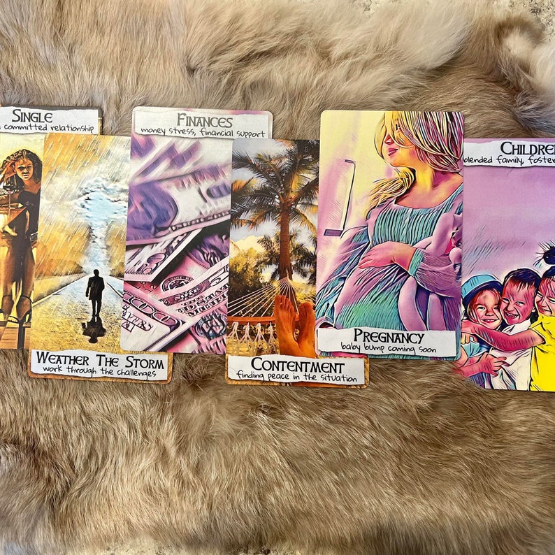 May include: A set of ten tarot cards with colorful illustrations and handwritten text. The cards depict themes of single life, finances, children, pregnancy, and contentment.