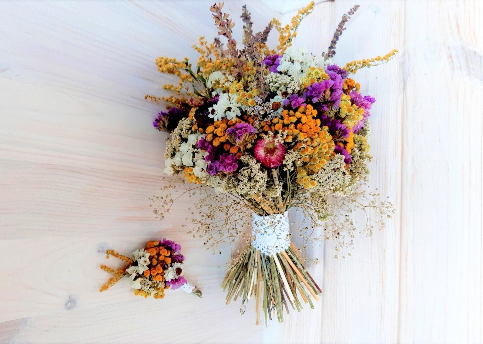 A Bouquet Of Dried Wildflowers In The Hands Of The Bride Close Up