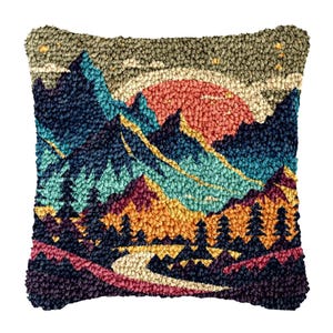May include: A colorful, hand-tufted throw pillow with a mountain scene. The pillow features a sunset over a mountain range with a winding river in the foreground. The pillow is made of a soft, plush fabric and is perfect for adding a touch of nature to any room.