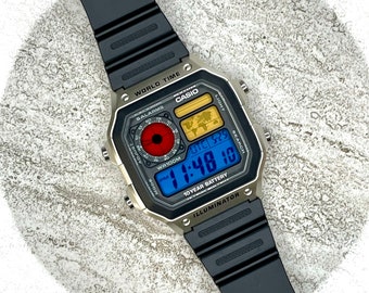 Montre heure universelle Casio argentée personnalisée avec écran couleur mod (couleurs au choix)