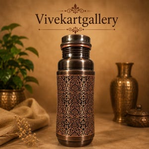 May include: A copper-toned water bottle with an ornate floral design. The bottle has a dark brown base and top, with the text "Vivekartgallery" above it. The bottle is cylindrical and appears to be made of metal.