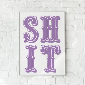 May include: A framed print with the words "SHIT IT" in large, purple, vintage-style lettering. The letters have a white outline and are set against a white background. The print is displayed on a white brick wall.