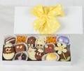Easter Chocolate Assortment. 16 Delicious Belgian Chocolates In White Gift Box And Yellow Spotty Ribbon.A Perfect Easter Gift For Him Or Her