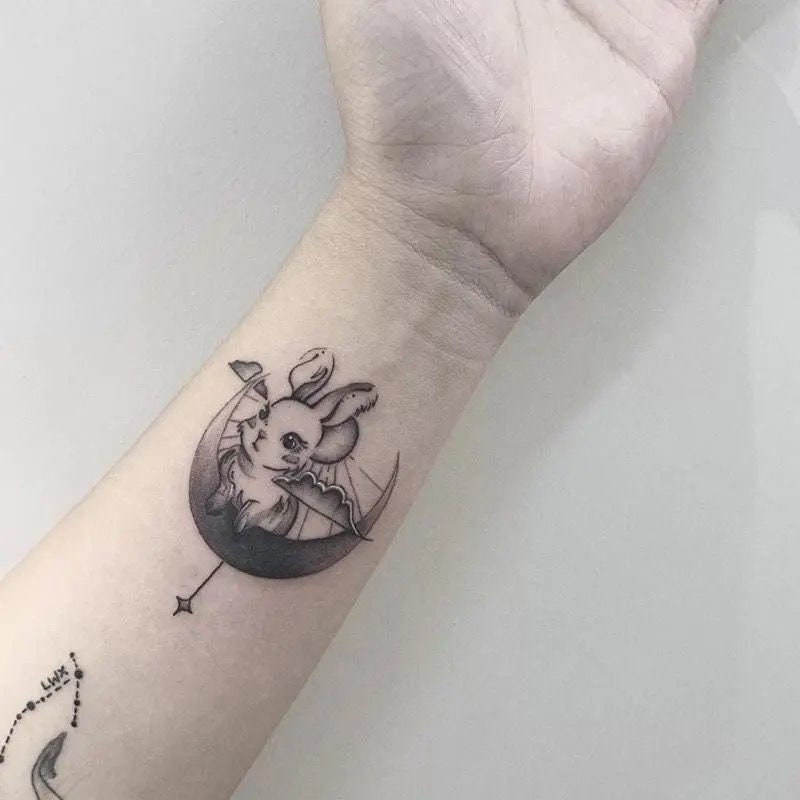 Small rabbit tattoo - Tattoogrid.net