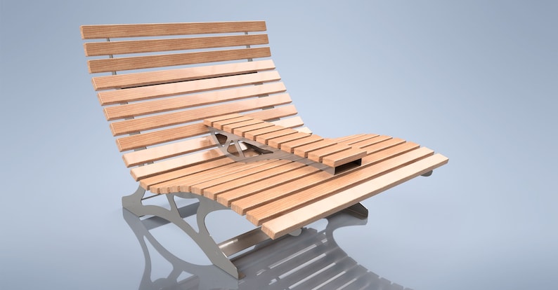 May include: A wooden bench with a curved design and a small table attached to the side. The bench is made of light brown wood and has a metal frame.