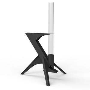 May include: A modern, black, three-legged stand with a clear, cylindrical glass tube. The stand has a geometric design and is set against a white background. The stand appears to be made of metal.