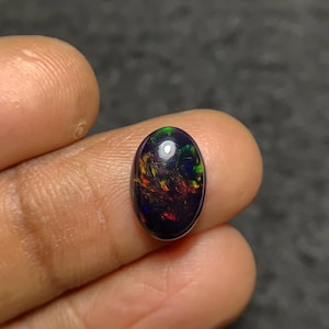 Natural Ethiopian Black Opal Smooth Oval Cabochon Loose Gemstone Fire Opal Cabochon Jewelry Wholesale Gems Pope gems 13x9x4 MM P1566