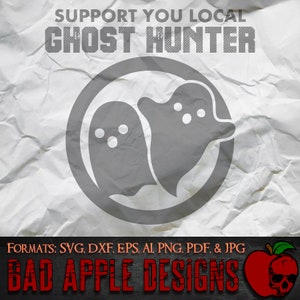 May include: A digital design featuring two white ghosts in a circle with the text "Support You Local Ghost Hunter" above and "Formats: SVG, DXF, EPS, AI PNG, PDF, & JPG Bad Apple Designs" below.
