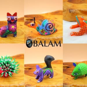 May include: Six hand-painted wooden animal figurines, including a cat, snail, frog, armadillo, squirrel, and mouse. The figurines are brightly colored and feature intricate details.