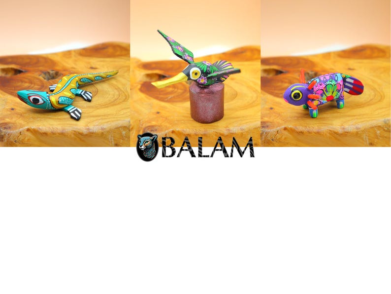 May include: Three hand-painted wooden animal figurines: a green and yellow lizard, a green hummingbird with a yellow beak, and a purple chameleon with colorful floral patterns.