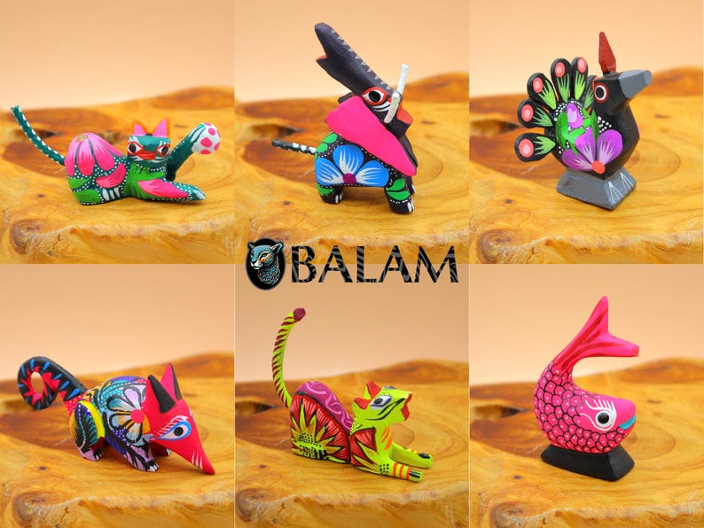May include: A set of six colorful wooden animal figurines, each with intricate details and vibrant paint. The animals include a cat, a peacock, a fish, a pig, a jaguar, and a tapir. The figurines are hand-painted and feature a variety of colors, including pink, green, blue, yellow, and red.
