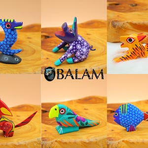 May include: Six colorful wooden animal figurines, including a blue seahorse, a purple pig, an orange tiger, a red coyote, a blue fish, and a green parrot. The figurines are hand-painted and have intricate details.