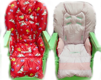 May include: Two high chair cushions, one red with a cartoon print and one pink. Both cushions have straps to secure them to the chair.