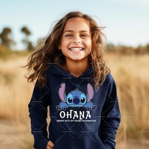 May include: A navy blue hooded sweatshirt with a cartoon Stitch design, the word "OHANA", and the phrase "NOBODY GETS LEFT BEHIND OR FORGOTTEN". The sweatshirt has a front pocket and a hood.