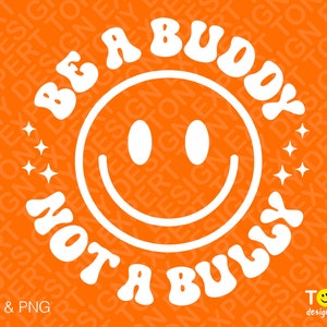 Puede incluir: Texto blanco sobre fondo naranja que dice "Be a Buddy Not a Bully" en una fuente retro. Una cara sonriente blanca está en el centro del texto.
