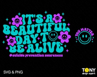 May include: It's a beautiful day to be alive.  A turquoise and purple graphic with a flower and smiley face design.  The text #suicide prevention awareness is included.