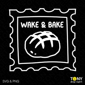 May include: Black and white illustration of a loaf of bread with the text "Wake & Bake" in a white frame with a decorative border.