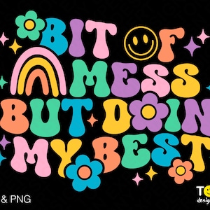 May include: A colorful graphic design with the text "Bit of mess but doin' my best" in a retro style. The design features a rainbow, flowers, and a smiley face.