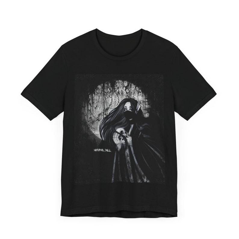May include: Black t-shirt with a graphic print of a woman in a black hooded cloak holding a skull. The graphic is in shades of gray and white and has a distressed, vintage look. The text "NORMAL IS DULL" is printed in white below the graphic.