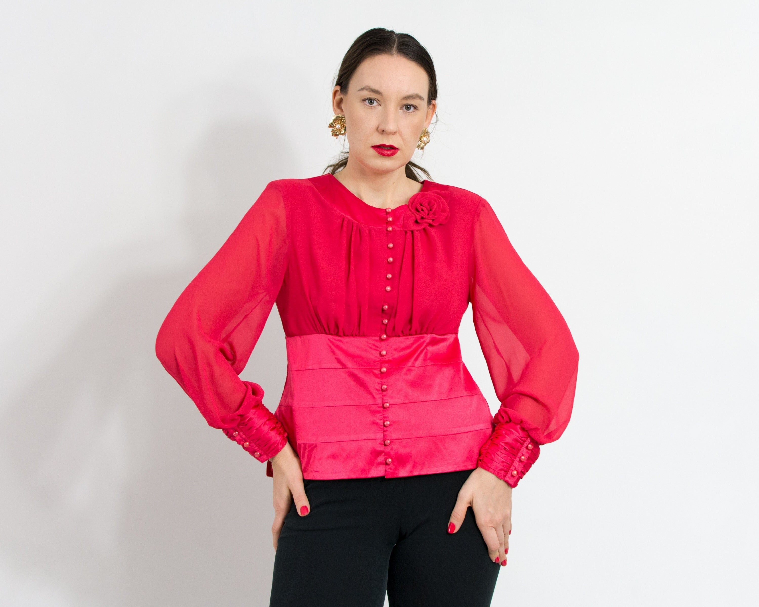 blusa roja manga larga transparente