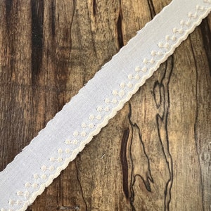 5/8&quot; ecru polka dots on white swiss cotton embroidery