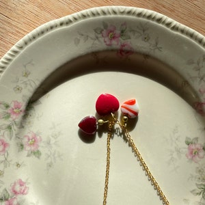 Sweet, pressed glass 3-charm heart necklace perfect for Valentine’s Day!