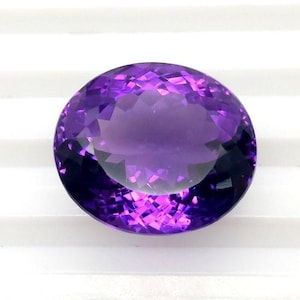 27 Carat Oval Amethyst Gemstone: Faceted Brazilian Purple Stone