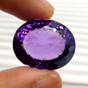 64 Carat Natural Amethyst Gemstone: Faceted Oval Brazilian Stone