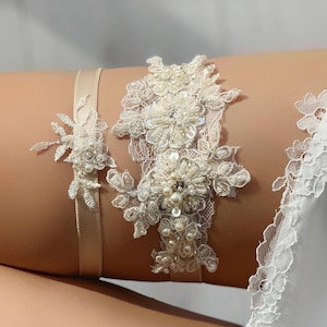 Jarretière de mariage en dentelle florale ivoire pour mariée, jarretière de mariée extensible fantaisie, ensemble de jarretelles de jambe bohème élégant, jarretière de cuisse antidérapante fantaisiste