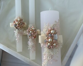 Velas decoradas con brillantes y perlas