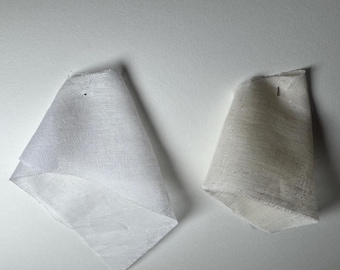 Muestras de tela para cortinas de cafetería: muselina, lino, crema y blanco