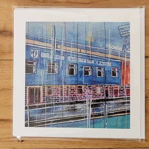 May include: A blue and red building with a white sign that says "The Boston Arms" and a white crest with a red heart. The building is painted in a watercolor style with a blue sky and white rain streaks.