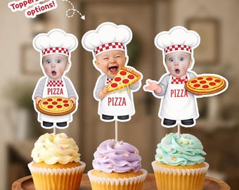 May include: Three cupcake toppers featuring cartoon-style babies dressed as chefs in white hats with red checkered bands and white aprons labeled PIZZA. Each baby holds a pizza illustration. The toppers are inserted into yellow, purple, and blue cupcakes.