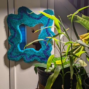 Squiggle wall hanging mirror