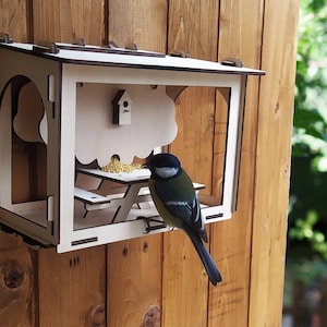 Unique DIY bird feeder with a seed tray. A gift for a bird lover.