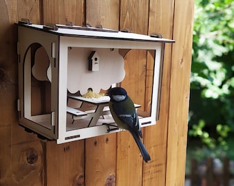 Bird feeder for the outdoors. Wall Mount Bird Feeder DIY. Great gift for a bird lover.