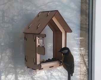Handmade window bird feeder made of plywood, with the possibility of personalization