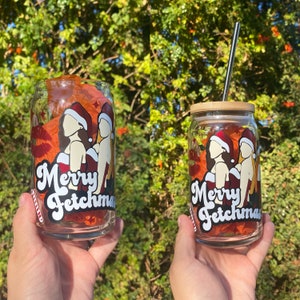 Merry fetch mas beer glass can; merry Christmas decor, Christmas decor, mean decor, christmas movies, the mean trio, holiday cups, chrismtas