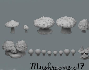 May include: A collection of 17 white mushroom models in various sizes and shapes. The image includes several mushroom caps, stems, and small round spheres. The text "Mushrooms x17" is written in cursive at the bottom.
