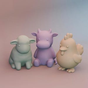 May include: Three pastel-coloured farm animal figurines: a sheep, a cow, and a chicken. The sheep is light green, the cow is purple, and the chicken is beige. Each figurine has a rounded, cartoonish design.