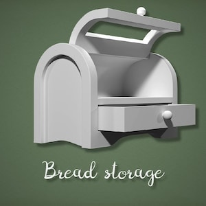 May include: A white bread storage container with a drawer and a curved top. The container has a rounded front door and a small handle on the drawer. The words "Bread storage" are written in a cursive font below the container.