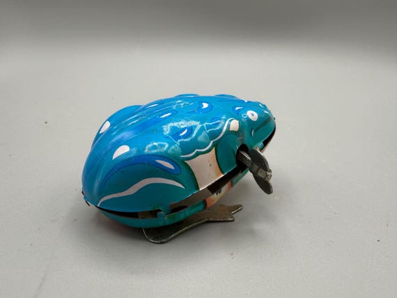 1970年代のヴィンテージジャンピングメカエルゼンマイ式ブリキおもちゃ