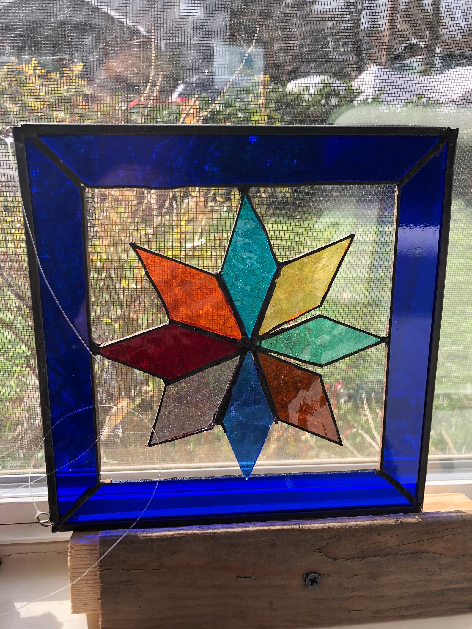 Multi-colored Stained glass star surrounded by deep blue | Etsy