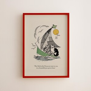 May include: Framed art print featuring an illustration of an owl and a cat sailing on a green boat. The sail is patchwork, and the sun and seagulls are in the sky. The text reads, "The Owl & the Pussycat went to sea, in a beautiful pea green boat."