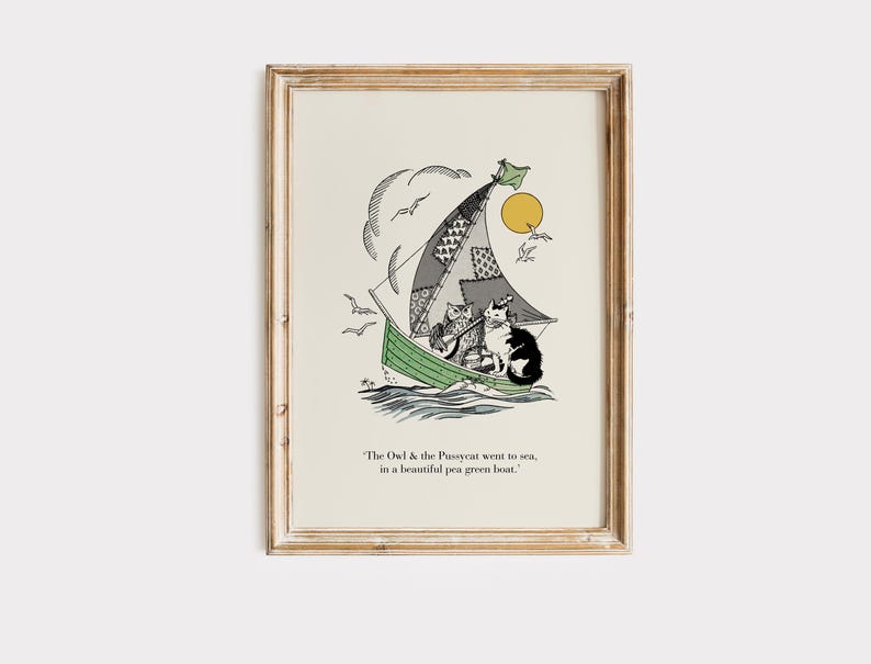 May include: A framed print featuring a whimsical illustration of cats sailing in a green boat. The sail is patchwork, and the sun shines above. The text at the bottom reads, "The Owl & the Pussycat went to sea, in a beautiful pen green boat."