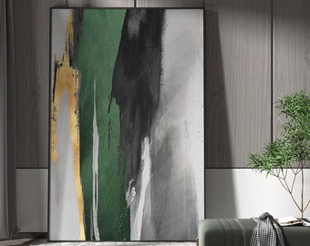 May include: Abstract art print with a black, green, and gold design on a white background. The print is framed in a black frame.